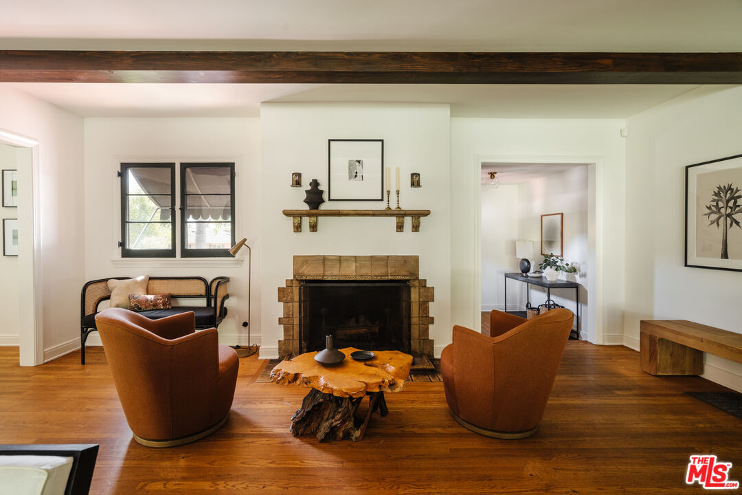 1175 Sonoma Drive Altadena, CA 91001 - Photo 8 of 68 a living room with furniture and a fireplace