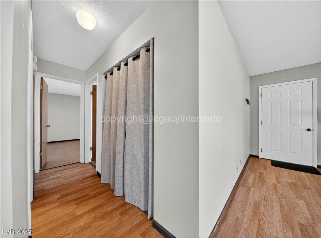 390 East 300 South, Unit 3A Parowan, UT 84761 - Photo 11 of 25 Hallway featuring light wood-style floors