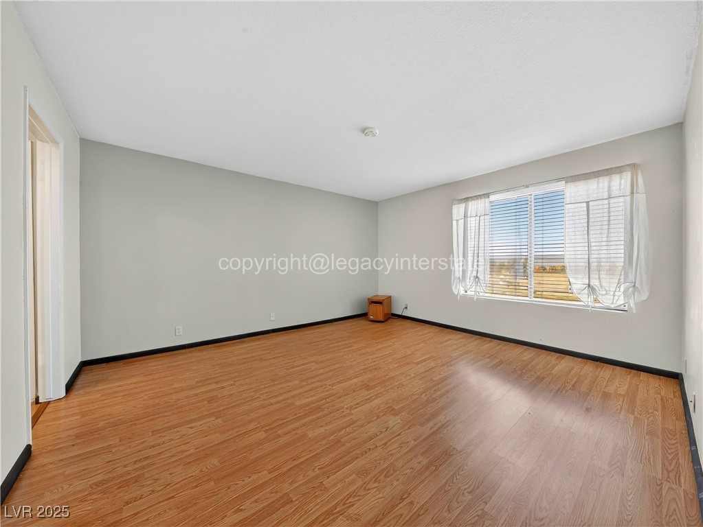 390 East 300 South, Unit 3A Parowan, UT 84761 - Photo 18 of 25 Empty room featuring light wood finished floors