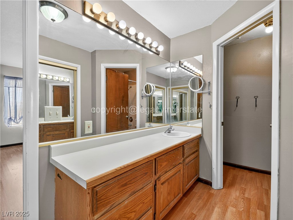 390 East 300 South, Unit 3A Parowan, UT 84761 - Photo 20 of 25 Full bath featuring light wood-style flooring and vanity