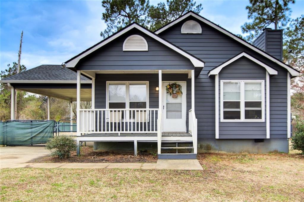 335 Old Airport Road Carrollton, GA 30116 - Photo 1 of 1 a front view of a house with a yard