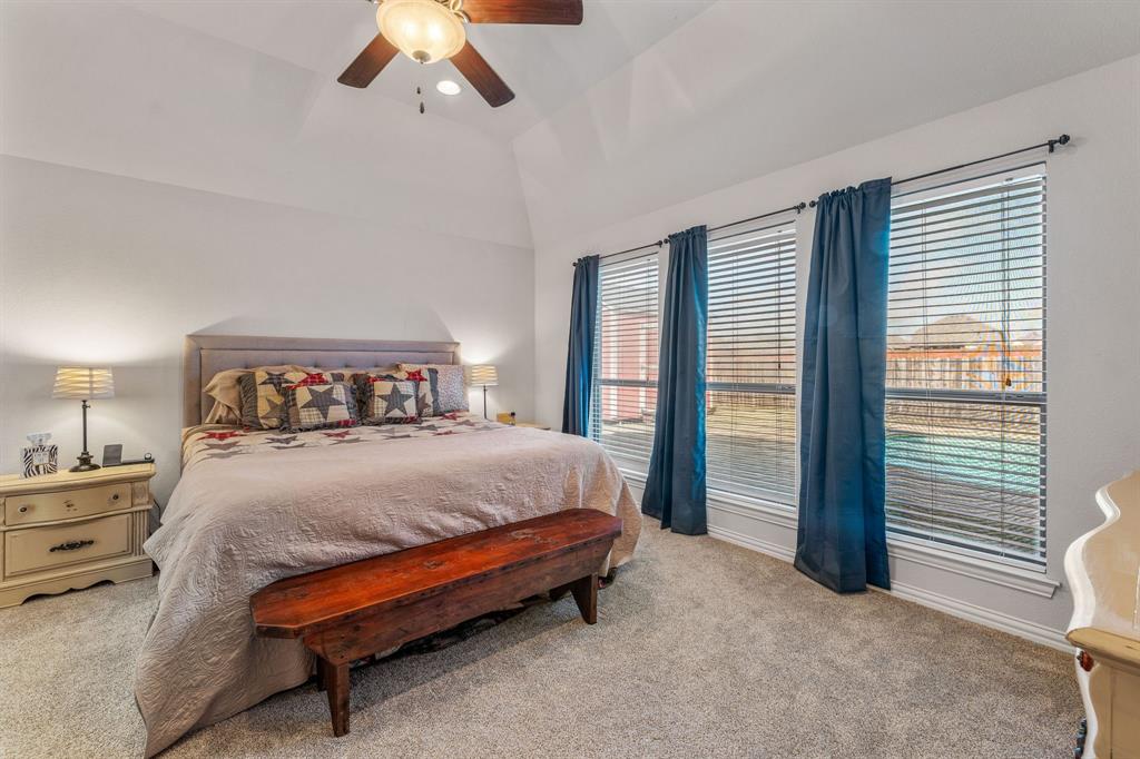 2936 Willow Ridge Circle Granbury, TX 76049 - Photo 21 of 33 a bedroom with a bed and a window