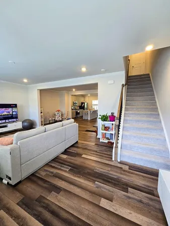 a room with a bed and gym equipment