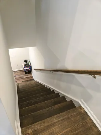 a bed room with a bed and a book shelf