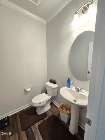 a bathroom with a sink a toilet and a bathtub