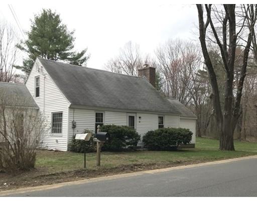11 Monson Turnpike Road Ware, MA 01082 - Photo 1 of 28 a front view of a house with a garden and trees