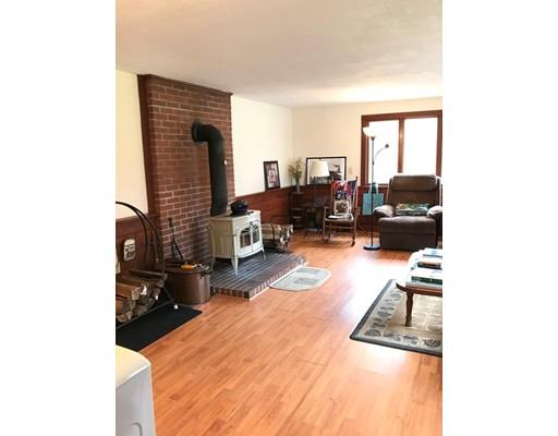 11 Monson Turnpike Road Ware, MA 01082 - Photo 19 of 28 a living room with furniture and a fireplace