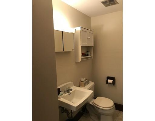11 Monson Turnpike Road Ware, MA 01082 - Photo 24 of 28 a bathroom with a toilet sink and mirror