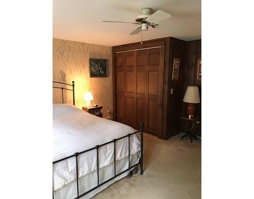 11 Monson Turnpike Road Ware, MA 01082 - Photo 26 of 28 a bedroom with a bed and a table