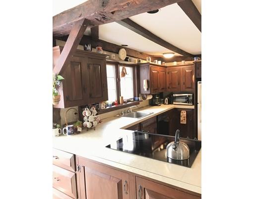 11 Monson Turnpike Road Ware, MA 01082 - Photo 8 of 28 a kitchen with a sink and cabinets