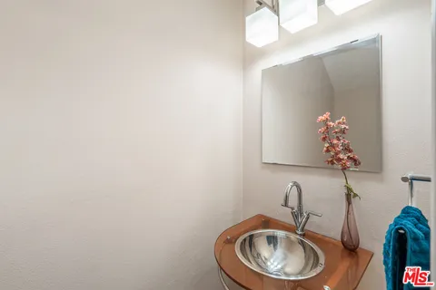 a bathroom with a toilet and sink