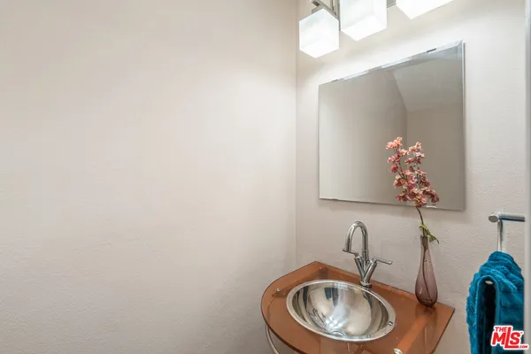 a bathroom with a toilet and sink