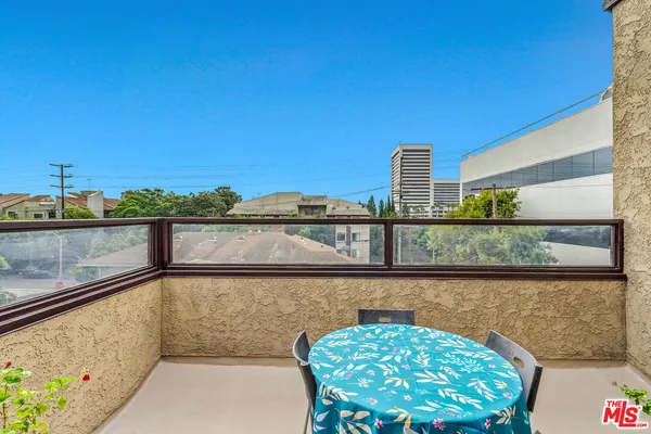 a view of a lake from a balcony