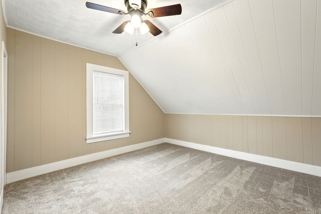 230 Sykes Street Three Rivers, MA 01080 - Photo 16 of 22 an empty room with windows and fan