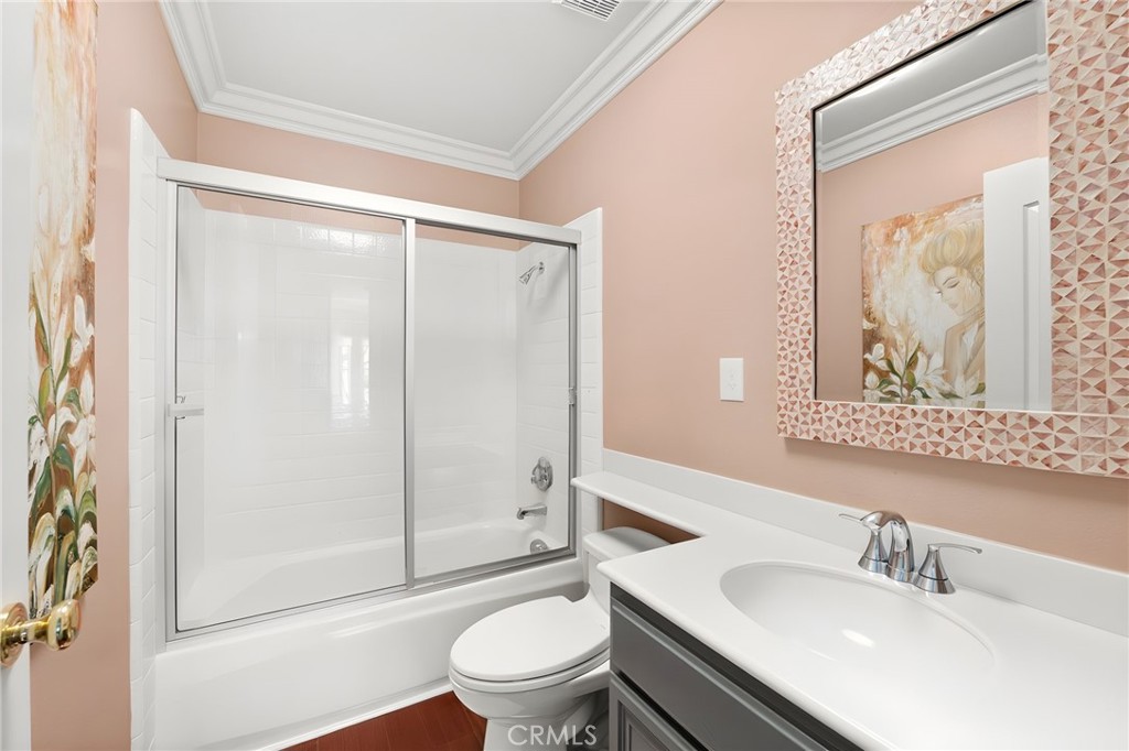 28561 Camelback Road Trabuco Canyon, CA 92679 - Photo 57 of 66 a bathroom with a sink a toilet and shower