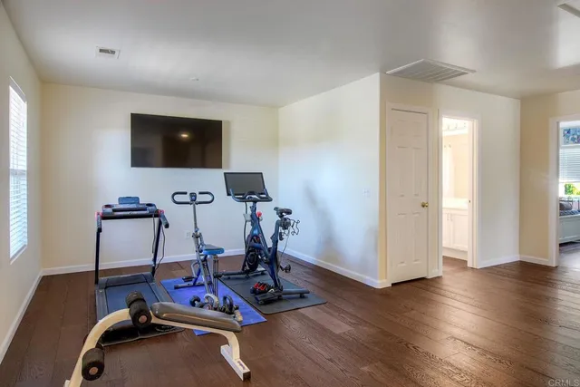 a view of a room with gym equipment