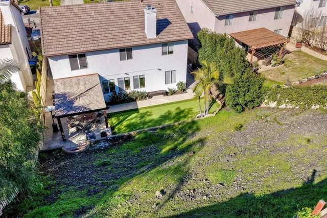 front view of a house with a garden
