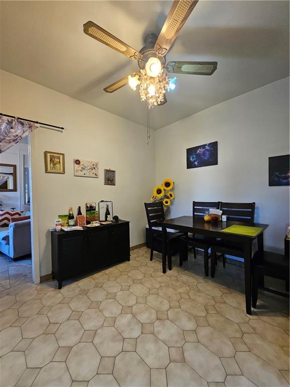 44 Quentin Road Brooklyn, NY 11223 - Photo 10 of 19 a view of a workspace with furniture