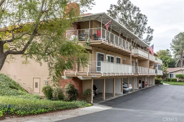 a view of a swimming pool and a yard