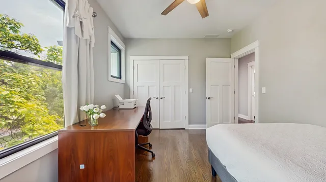 a bed room with a bed and furniture