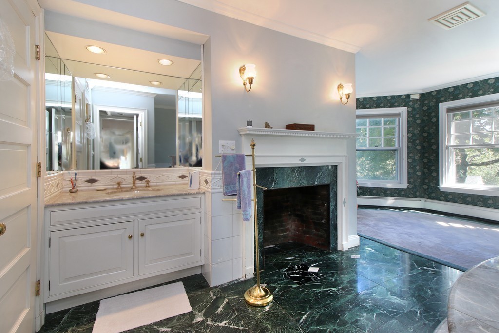 123 Buckminster Road Brookline, MA 02445 - Photo 19 of 28 a living room with furniture and a fireplace