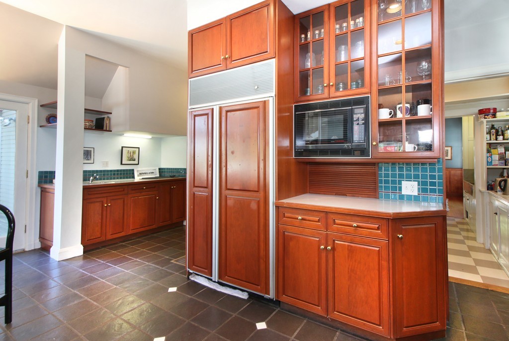 123 Buckminster Road Brookline, MA 02445 - Photo 9 of 28 a kitchen with stainless steel appliances granite countertop a refrigerator and a stove