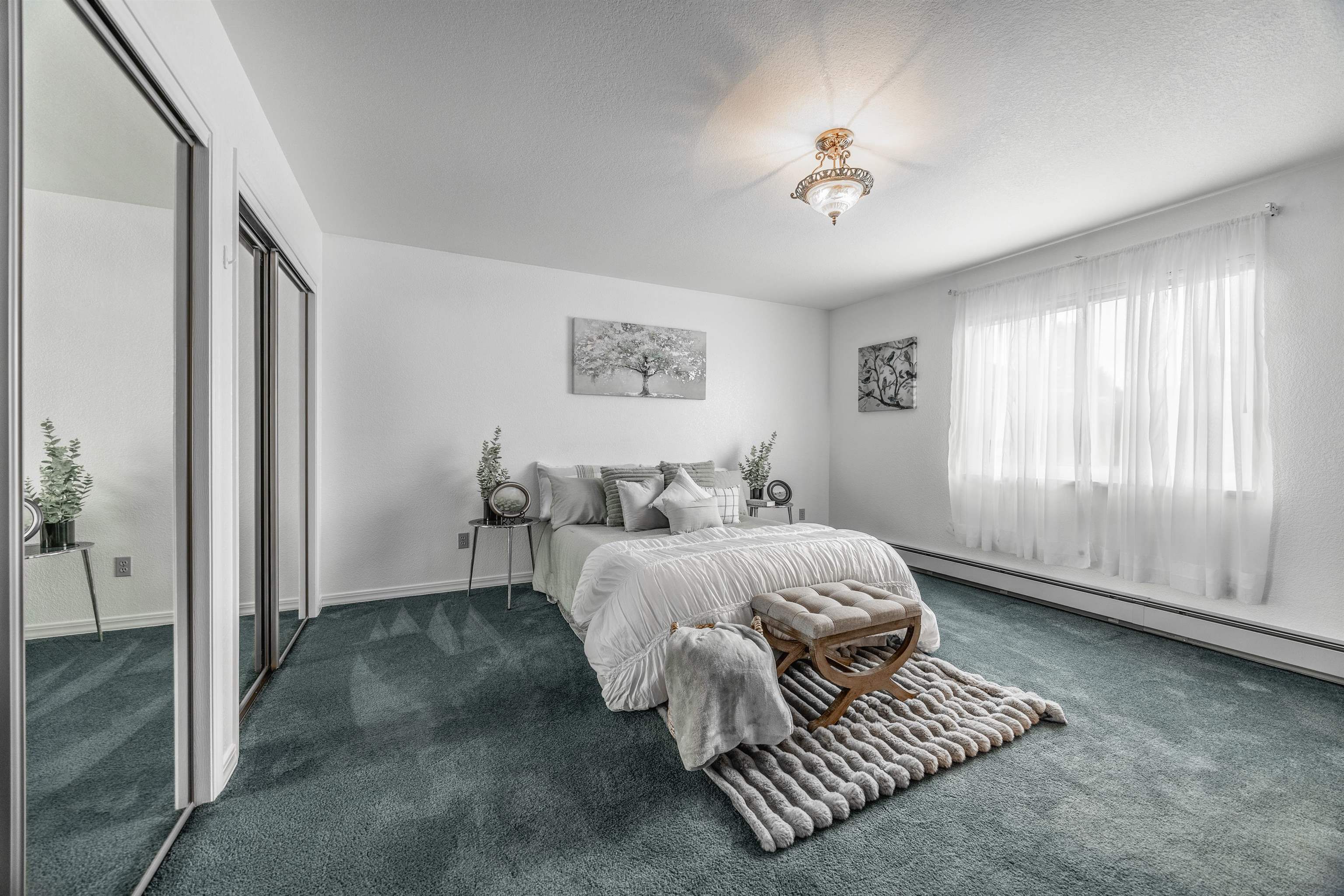 2135 Winston Way, Unit B Montrose, CO 81401 - Photo 16 of 25 a bed room with a bed and a window