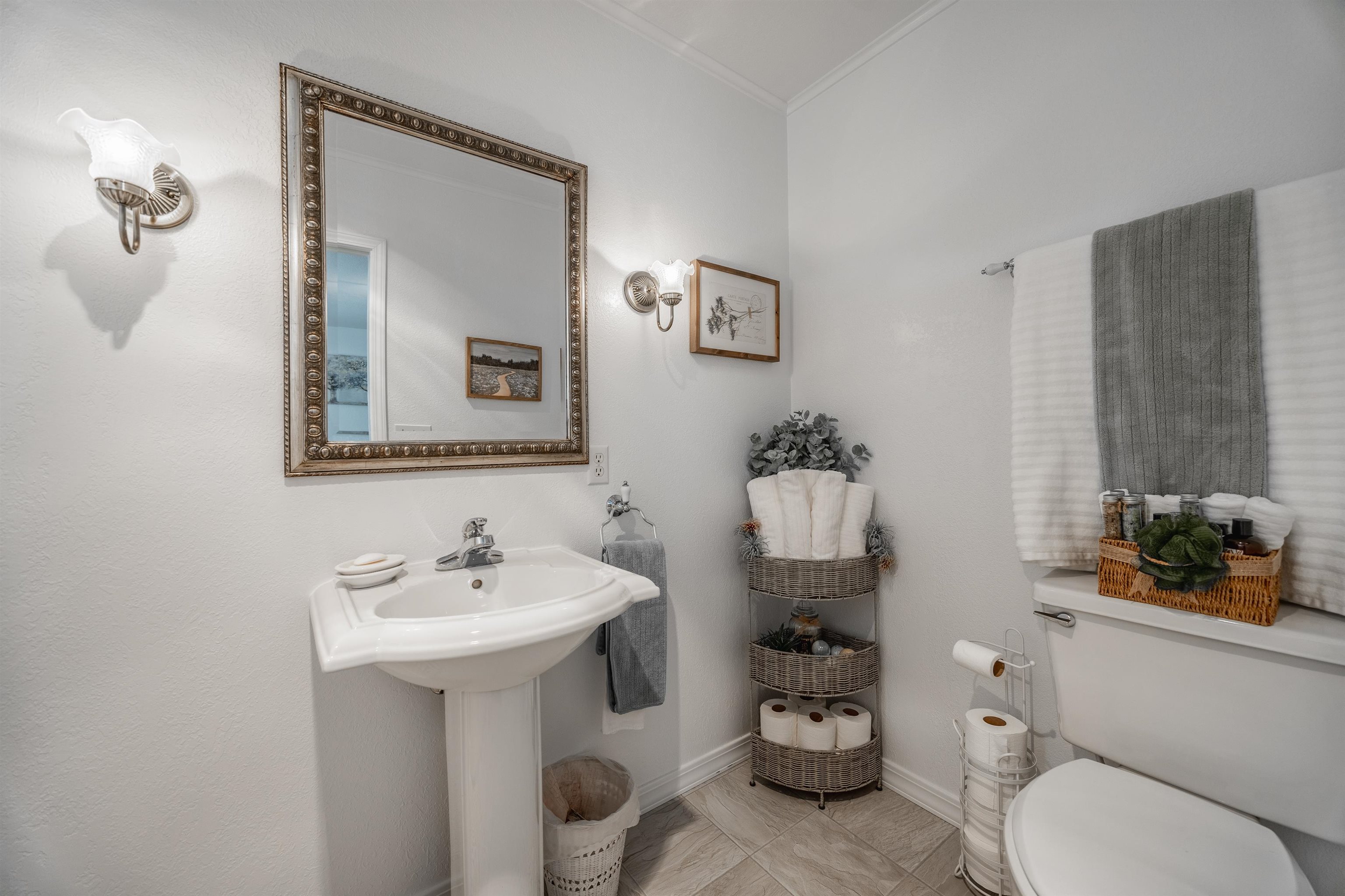 2135 Winston Way, Unit B Montrose, CO 81401 - Photo 20 of 25 a bathroom with a sink mirror and toilet