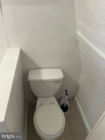 a close view of a toilet in a bathroom