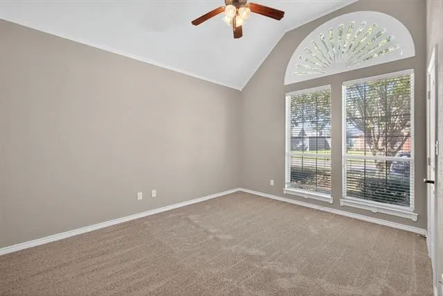 an empty room with a large window