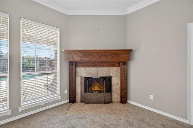 a living room with a fireplace