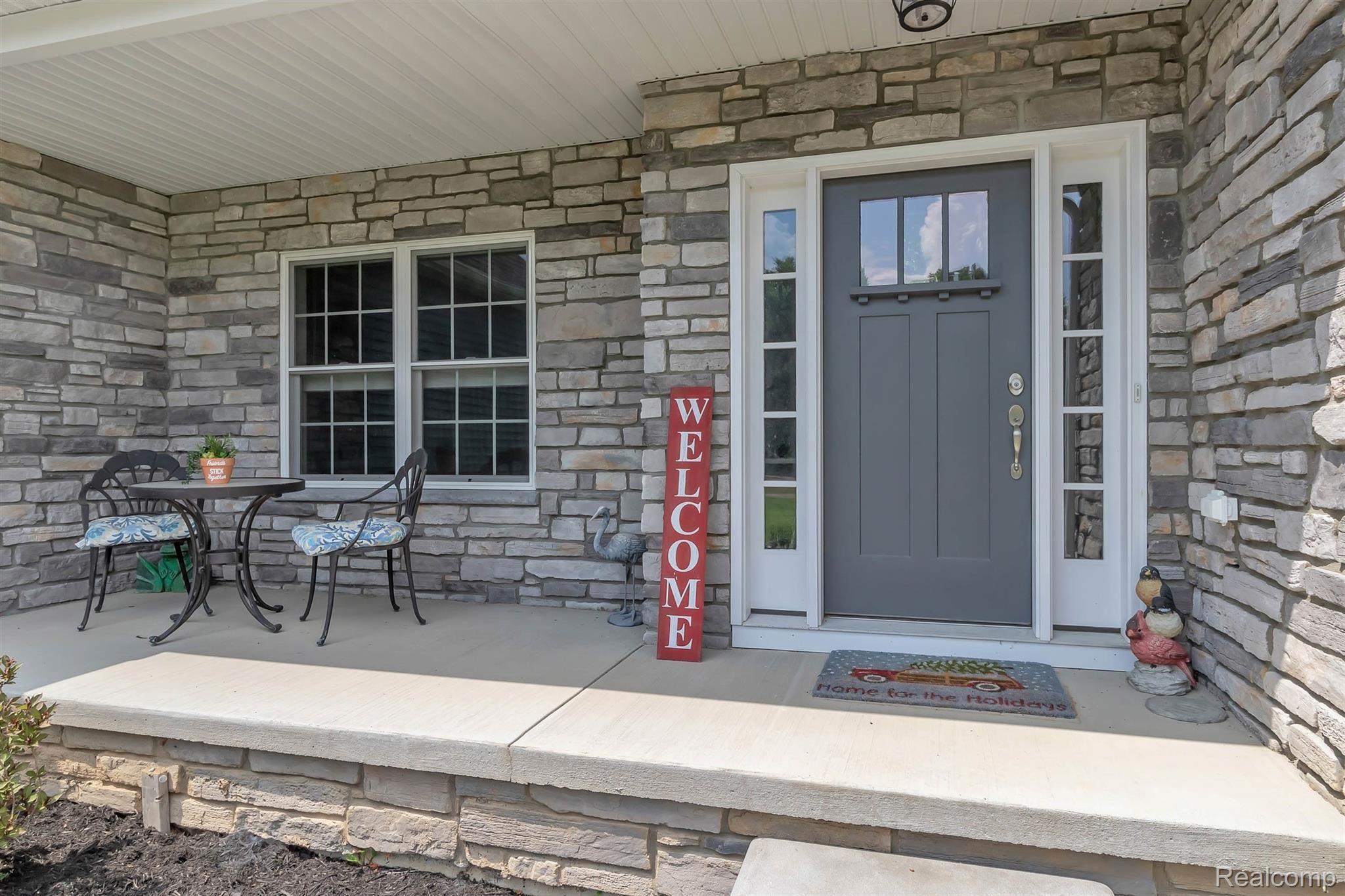 860 North Hacker Road Howell, MI 48843 - Photo 11 of 53 Enter through Front Door