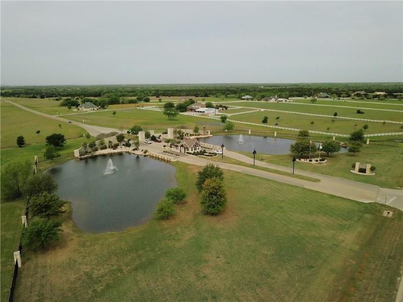 10019 Ridgeway Whitney, TX 76692 - Photo 13 of 36 an aerial view of ocean and houses with outdoor space