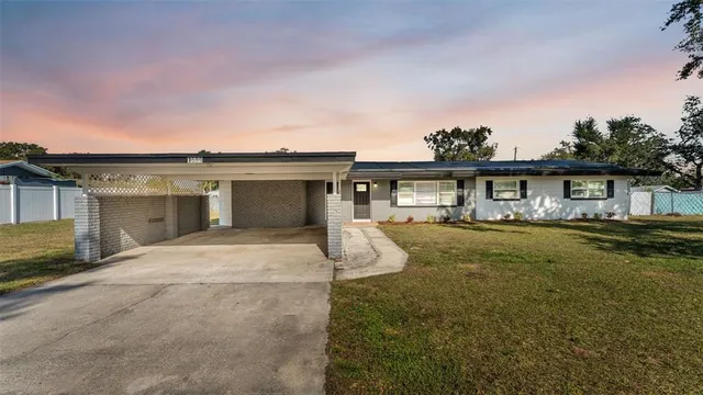 front view of a house with a yard
