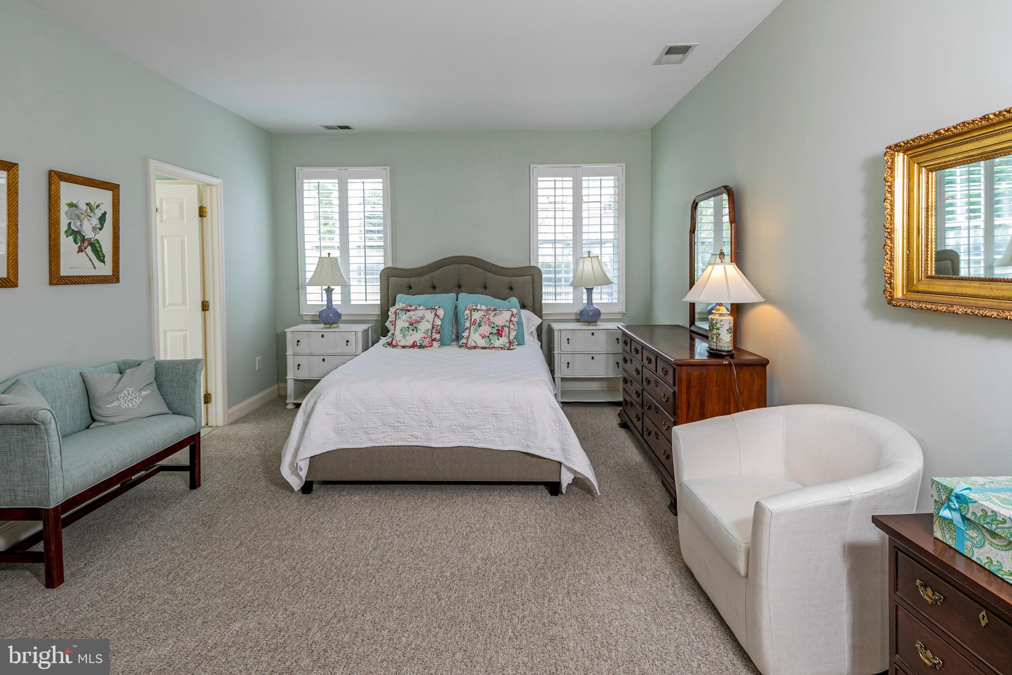 24 Foster Road Pennington, NJ 08534 - Photo 17 of 38 a bedroom with a bed a couch and dresser
