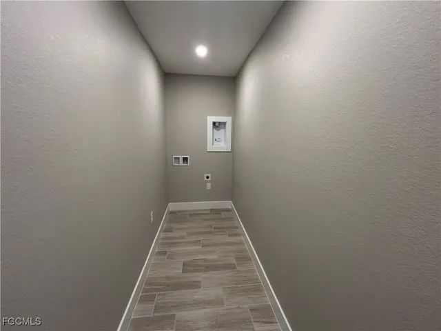 a view of hallway with stairs