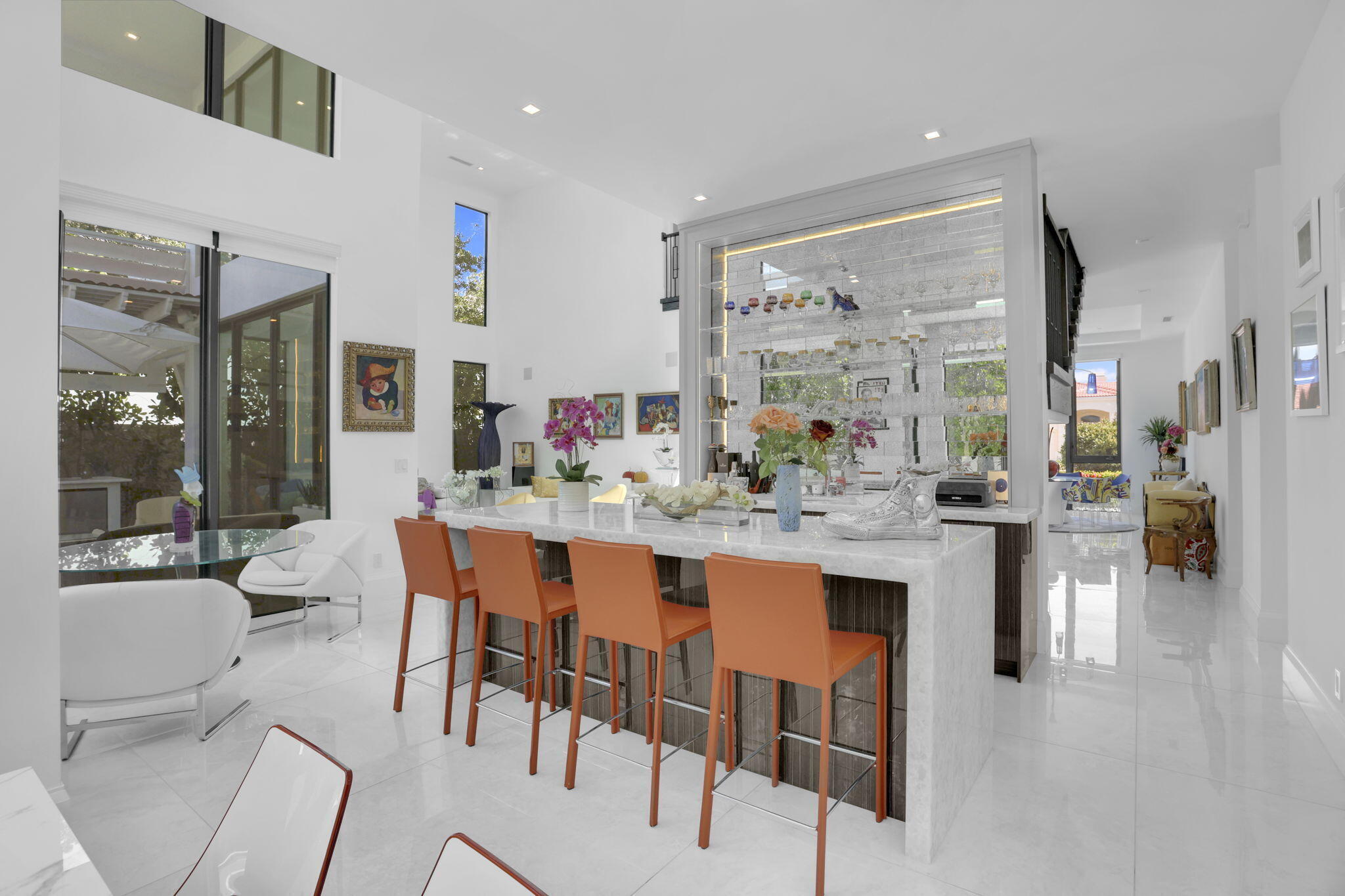 234 Northeast 4th Street Boca Raton, FL 33432 - Photo 17 of 72 a dining hall with stainless steel appliances kitchen island granite countertop a table and chairs