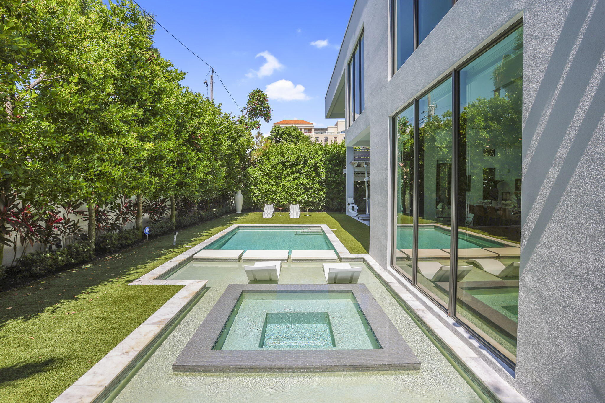234 Northeast 4th Street Boca Raton, FL 33432 - Photo 31 of 72 a view of swimming pool from a balcony