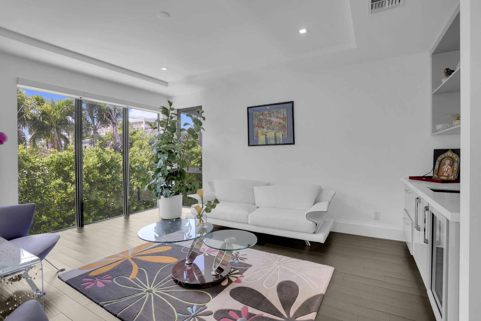 234 Northeast 4th Street Boca Raton, FL 33432 - Photo 40 of 72 a living room with furniture and a table