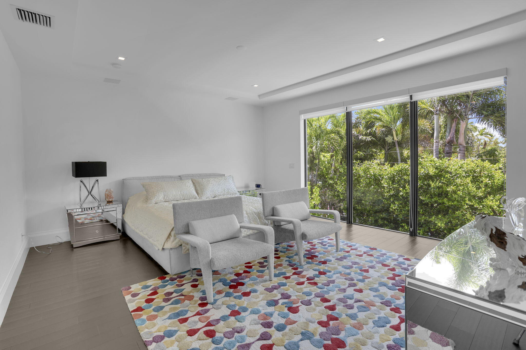 234 Northeast 4th Street Boca Raton, FL 33432 - Photo 42 of 72 a living room with furniture and a floor to ceiling window
