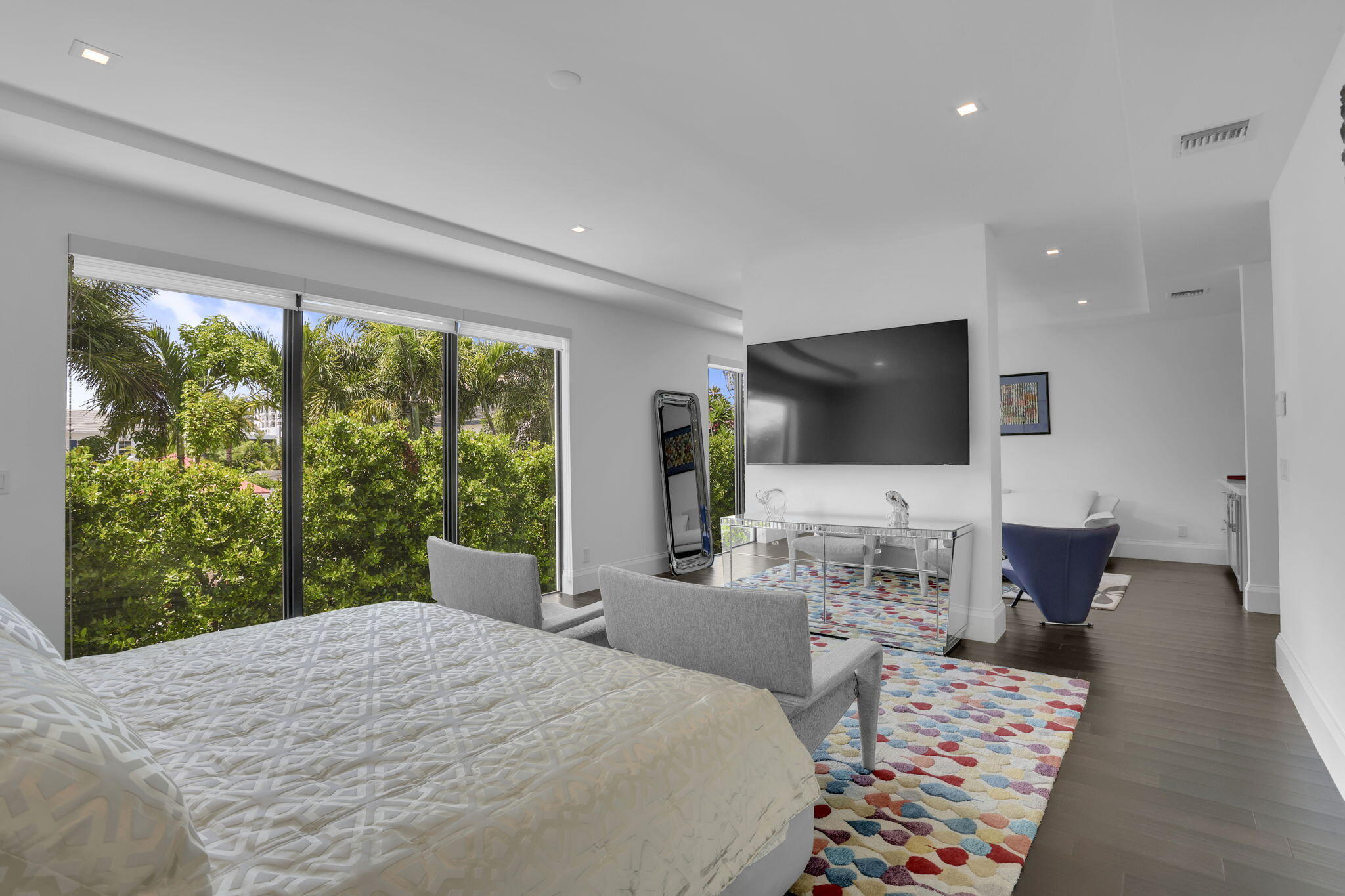 234 Northeast 4th Street Boca Raton, FL 33432 - Photo 44 of 72 a bedroom with a bed and a flat screen tv