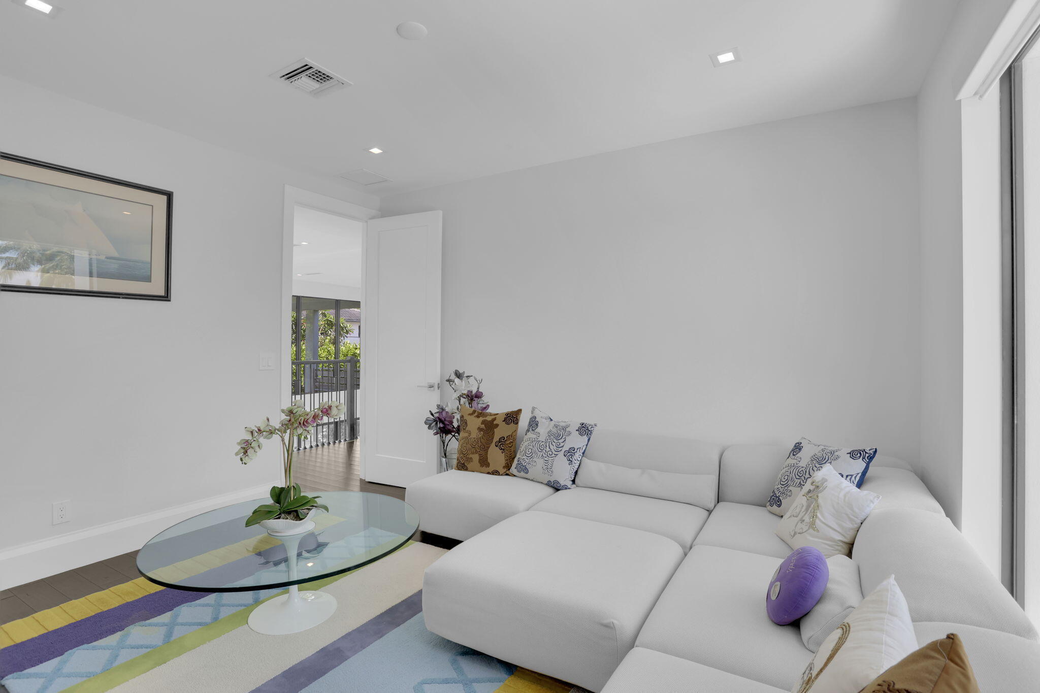 234 Northeast 4th Street Boca Raton, FL 33432 - Photo 50 of 72 a living room with furniture and a table