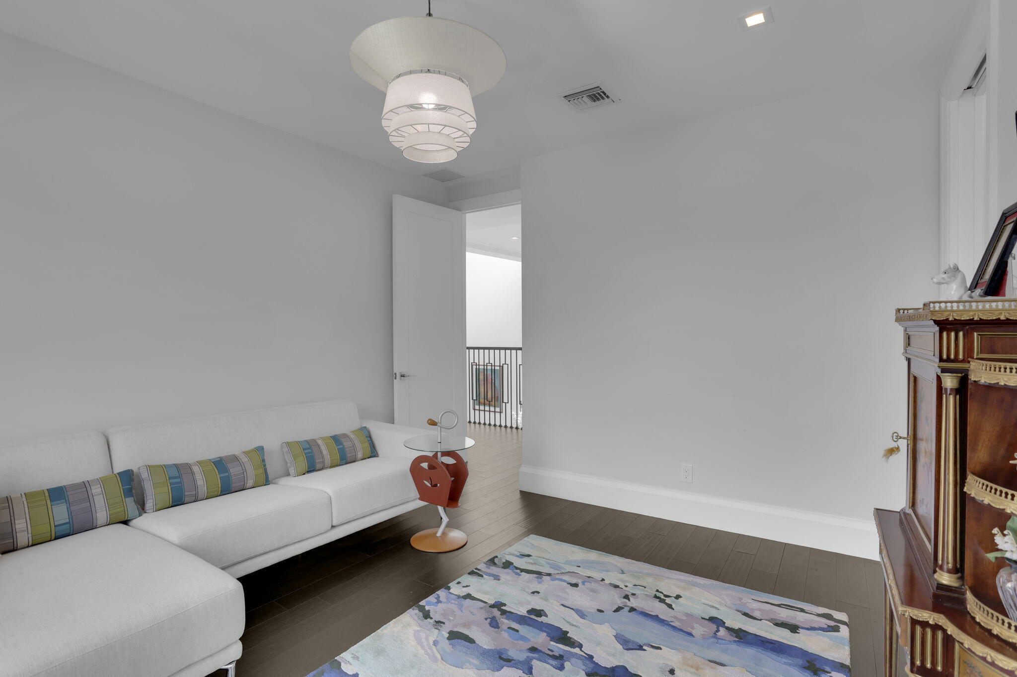 234 Northeast 4th Street Boca Raton, FL 33432 - Photo 53 of 72 a living room with furniture and a wooden floor