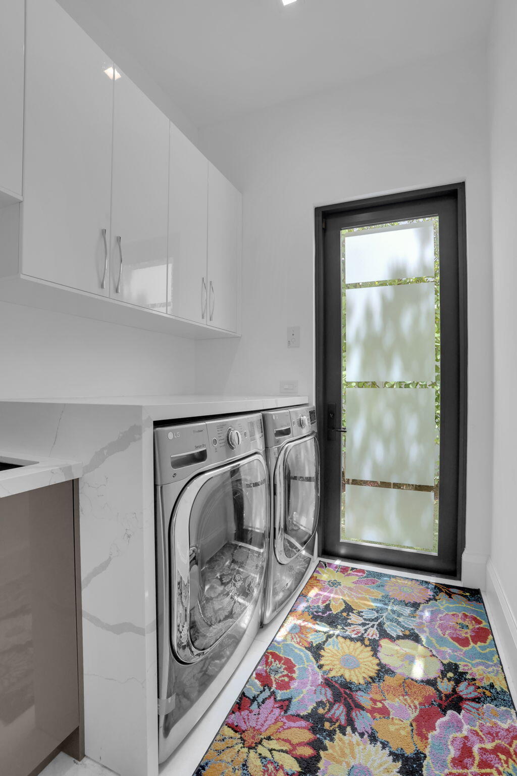 234 Northeast 4th Street Boca Raton, FL 33432 - Photo 61 of 72 a bedroom with a bed and a window