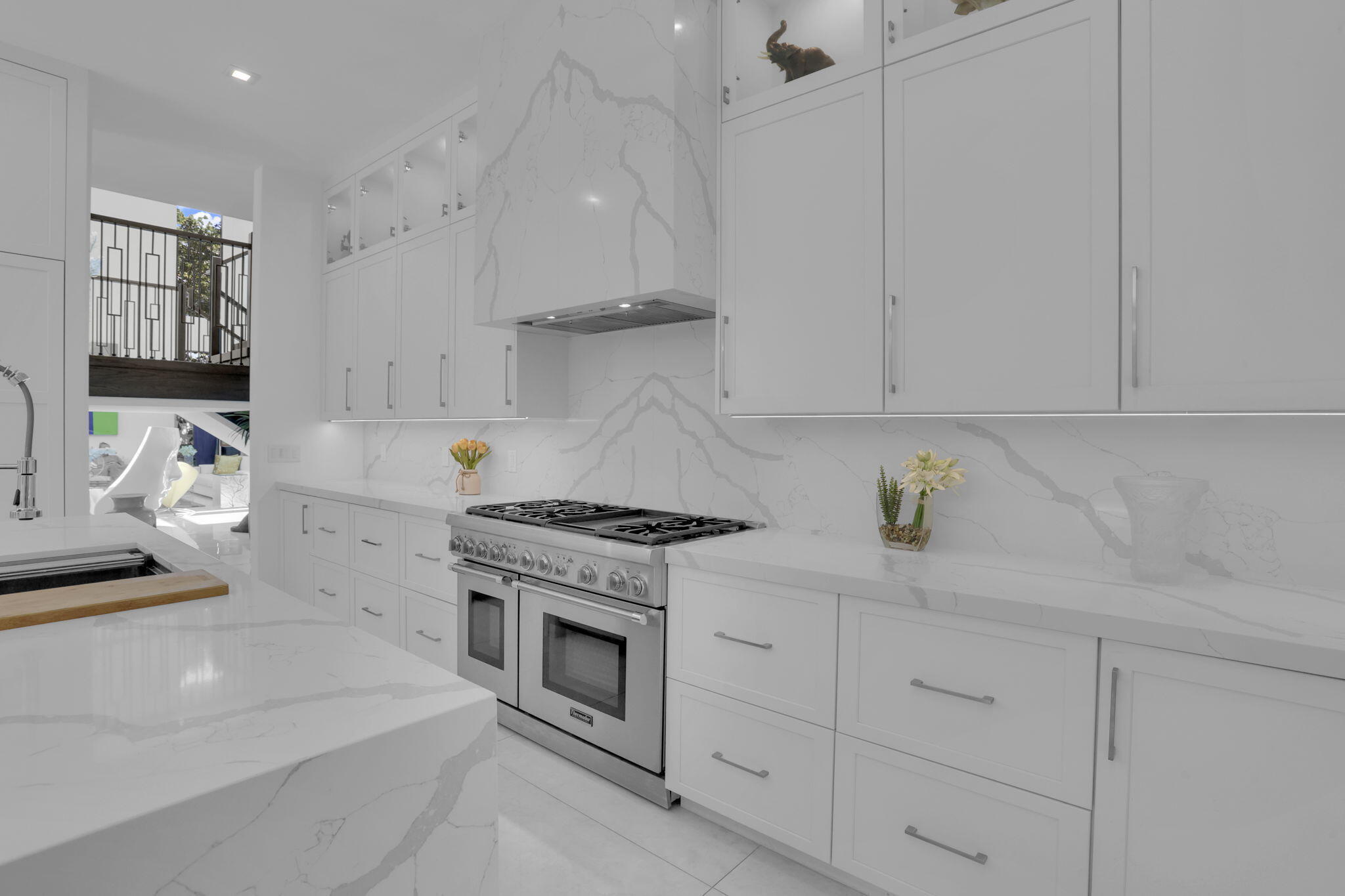 234 Northeast 4th Street Boca Raton, FL 33432 - Photo 10 of 72 a kitchen with granite countertop cabinets stainless steel appliances and a sink