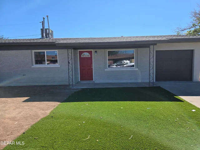 a front view of house with yard