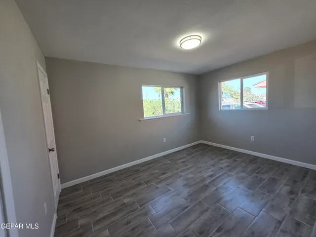 an empty room with windows