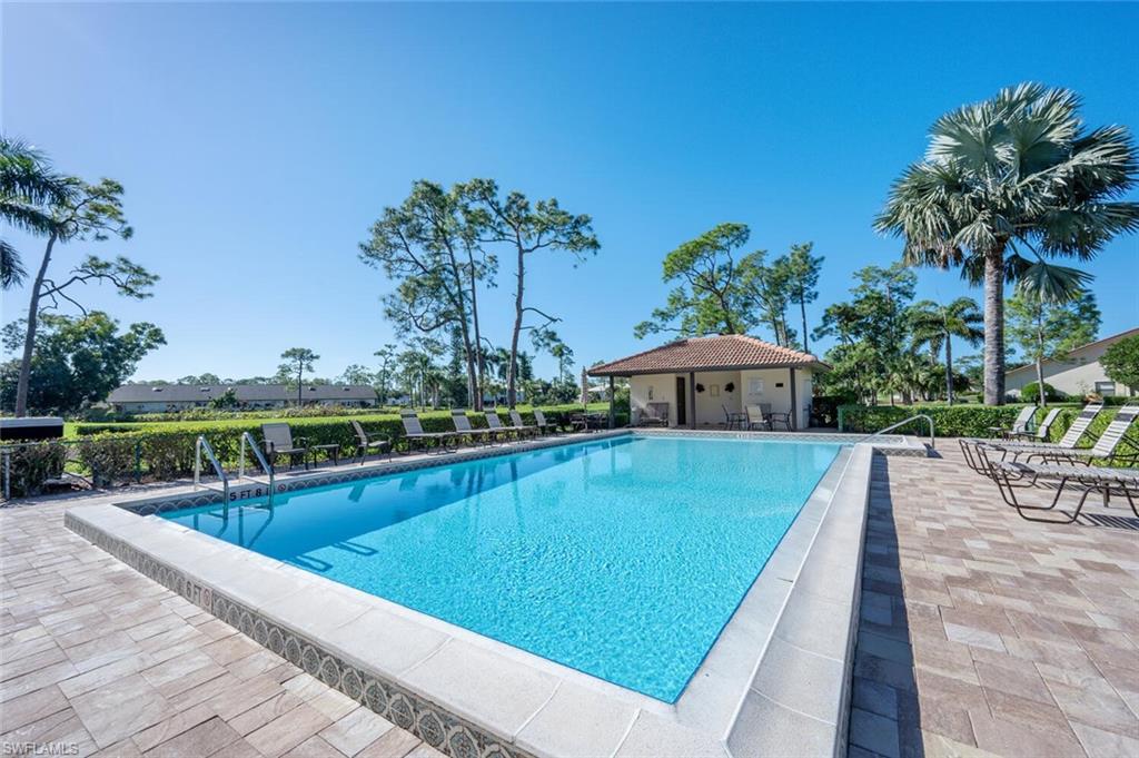 644 Augusta Boulevard Naples, FL 34113 - Photo 37 of 40 a view of a swimming pool with a patio