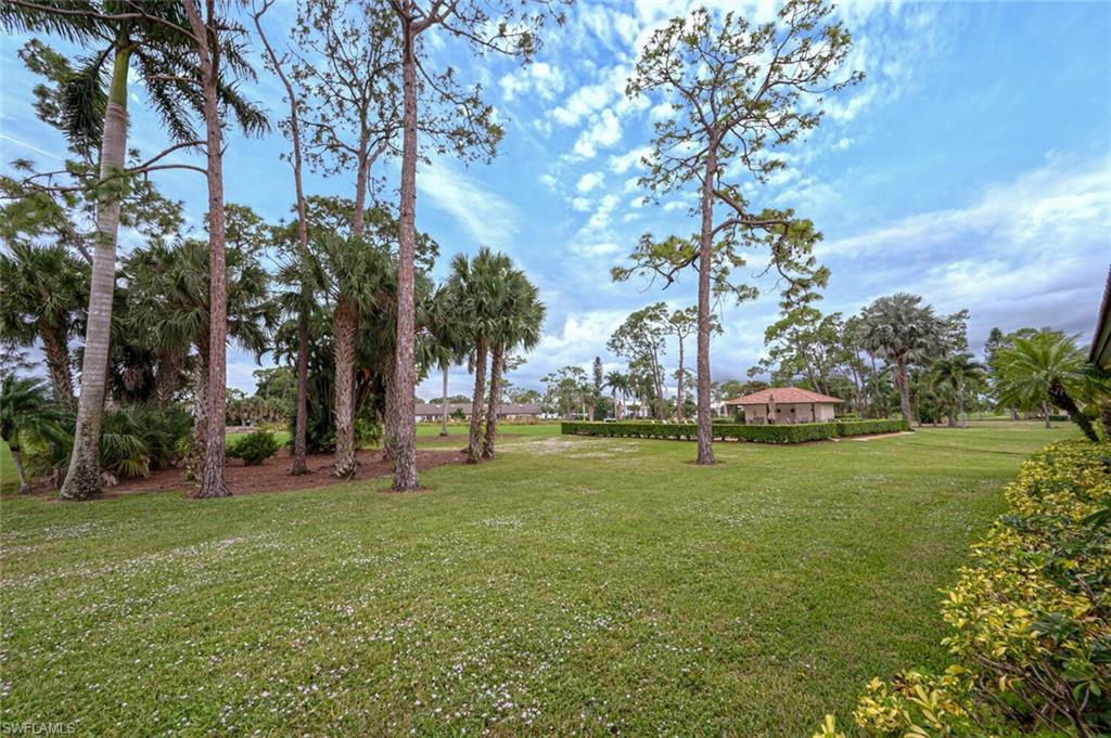 644 Augusta Boulevard Naples, FL 34113 - Photo 40 of 40 a view of a park with large trees