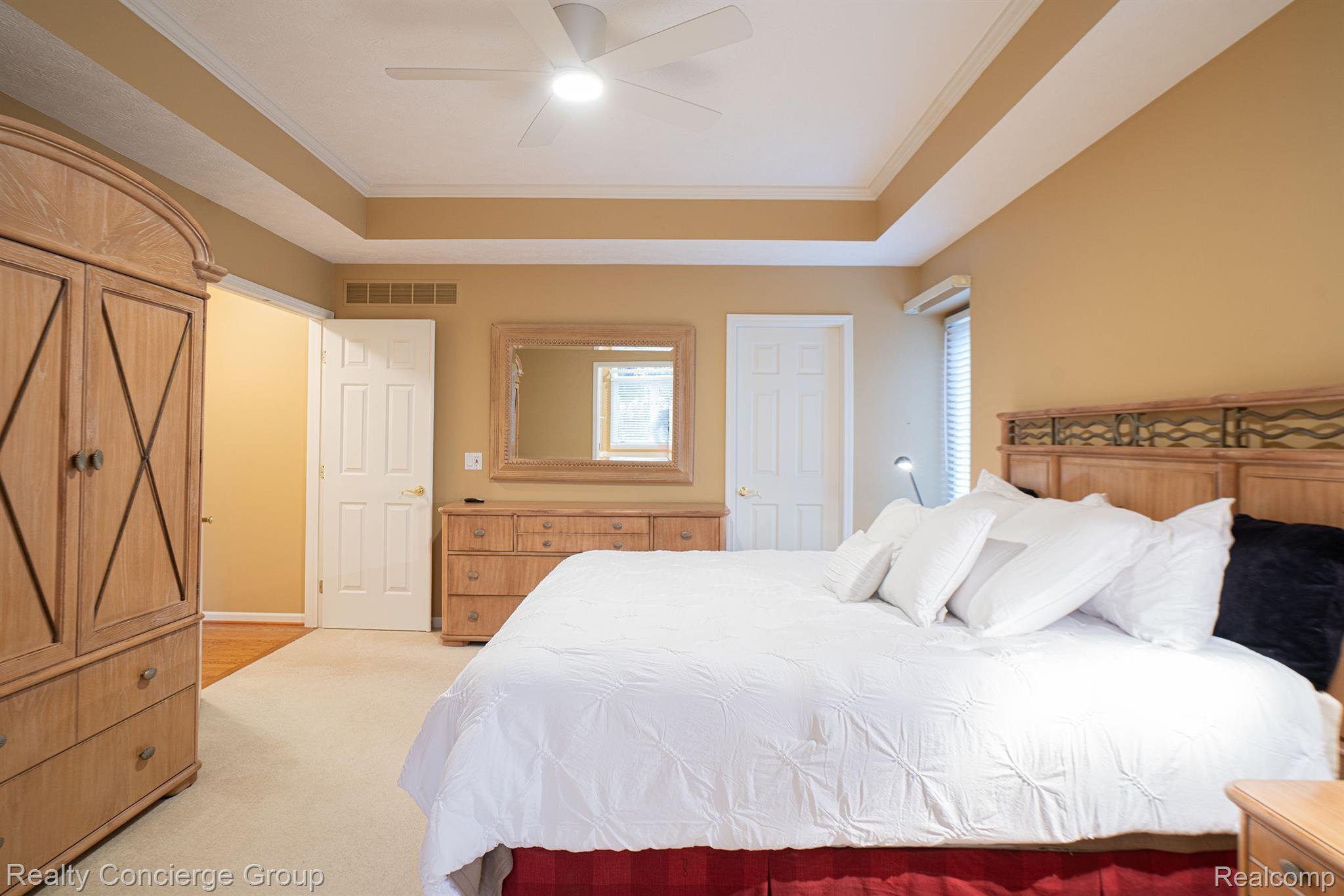 9514 Quail Ridge Run Brighton, MI 48114 - Photo 11 of 37 Upgraded tray ceiling adds style to the room